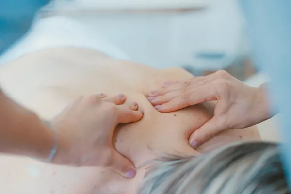 Hands on chiropractic treatment alongside movement and strength work